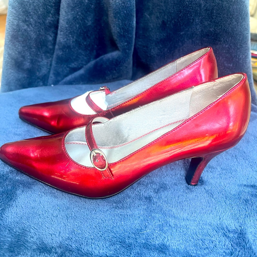 Brilliant high gloss lipstick red Mary Jane pumps.